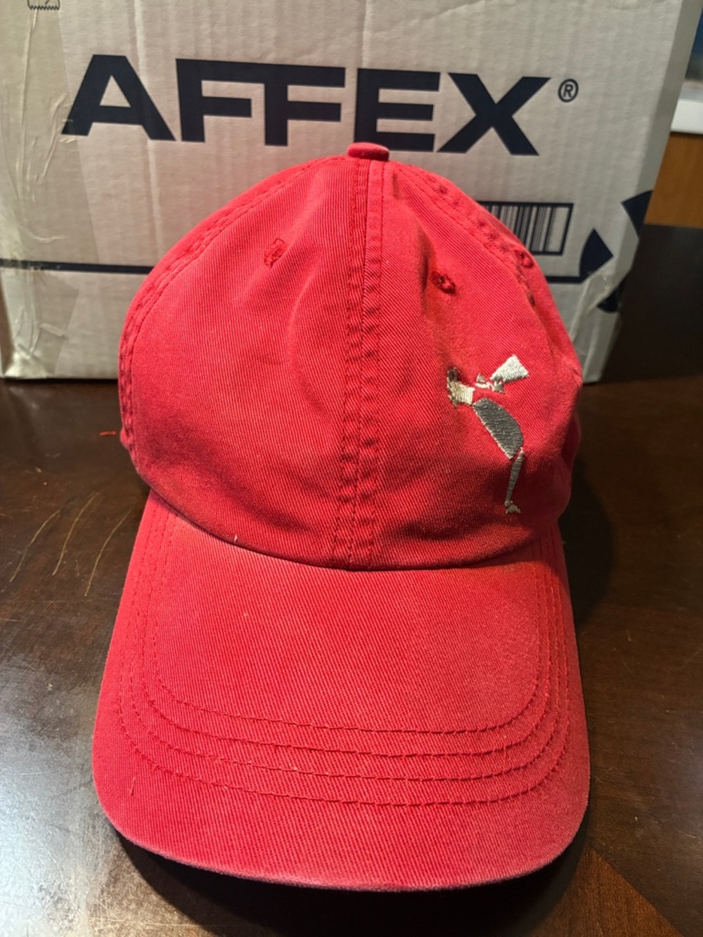 Alternative Apparel Red Baseball Cap with Small Embroidered Figure